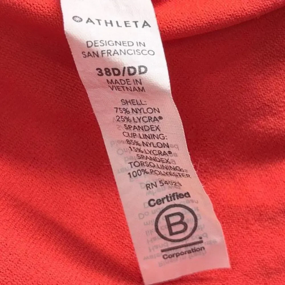 Athleta bra-sized tankini swim top in coral/orange. Size 38D/DD
